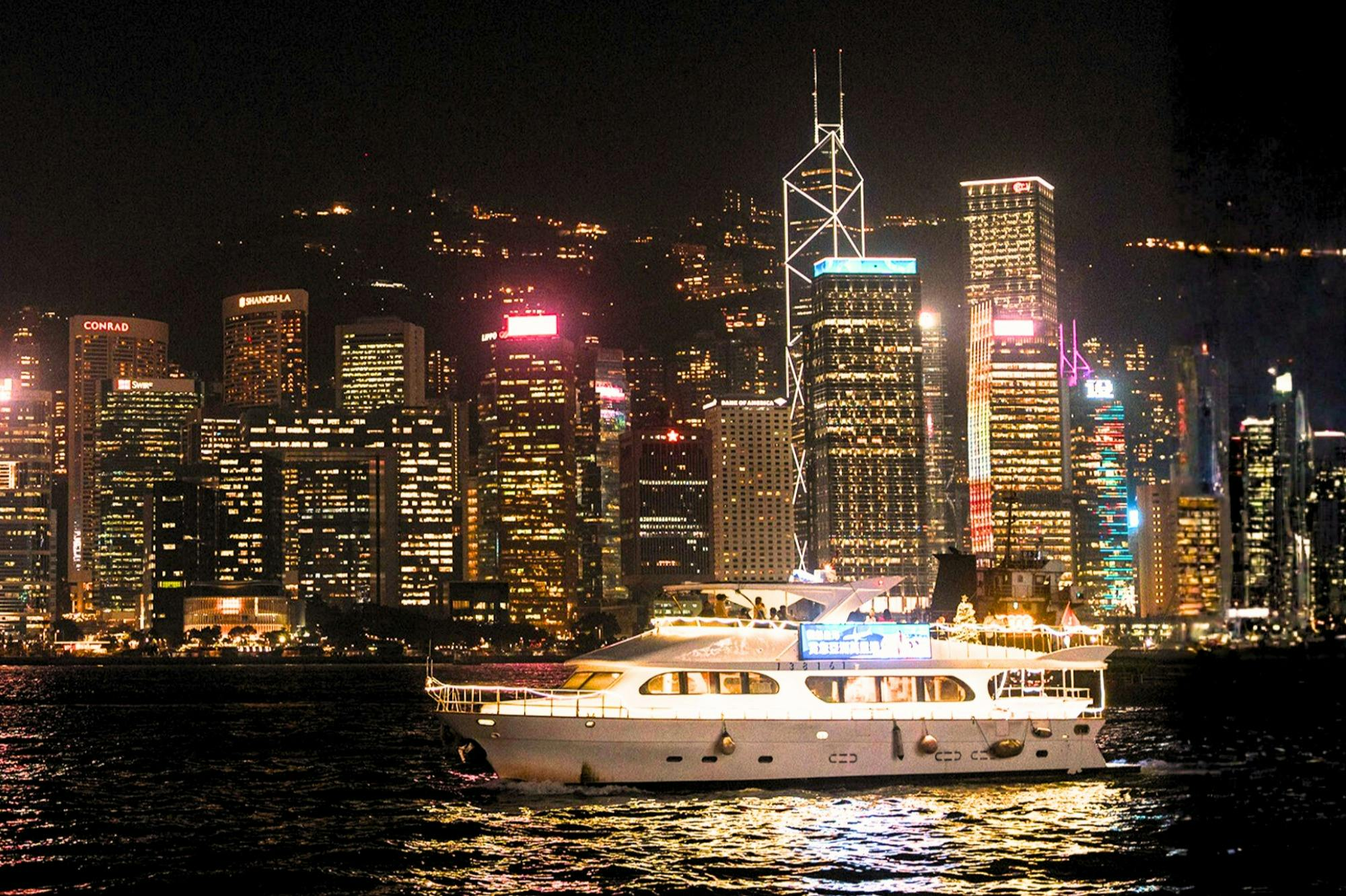 Hong Kong Victoria Harbour: Night Cruise with Unlimited Snacks & Drinks - Photo 1 of 8